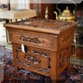 F18. Indian carved side table with lift top. 